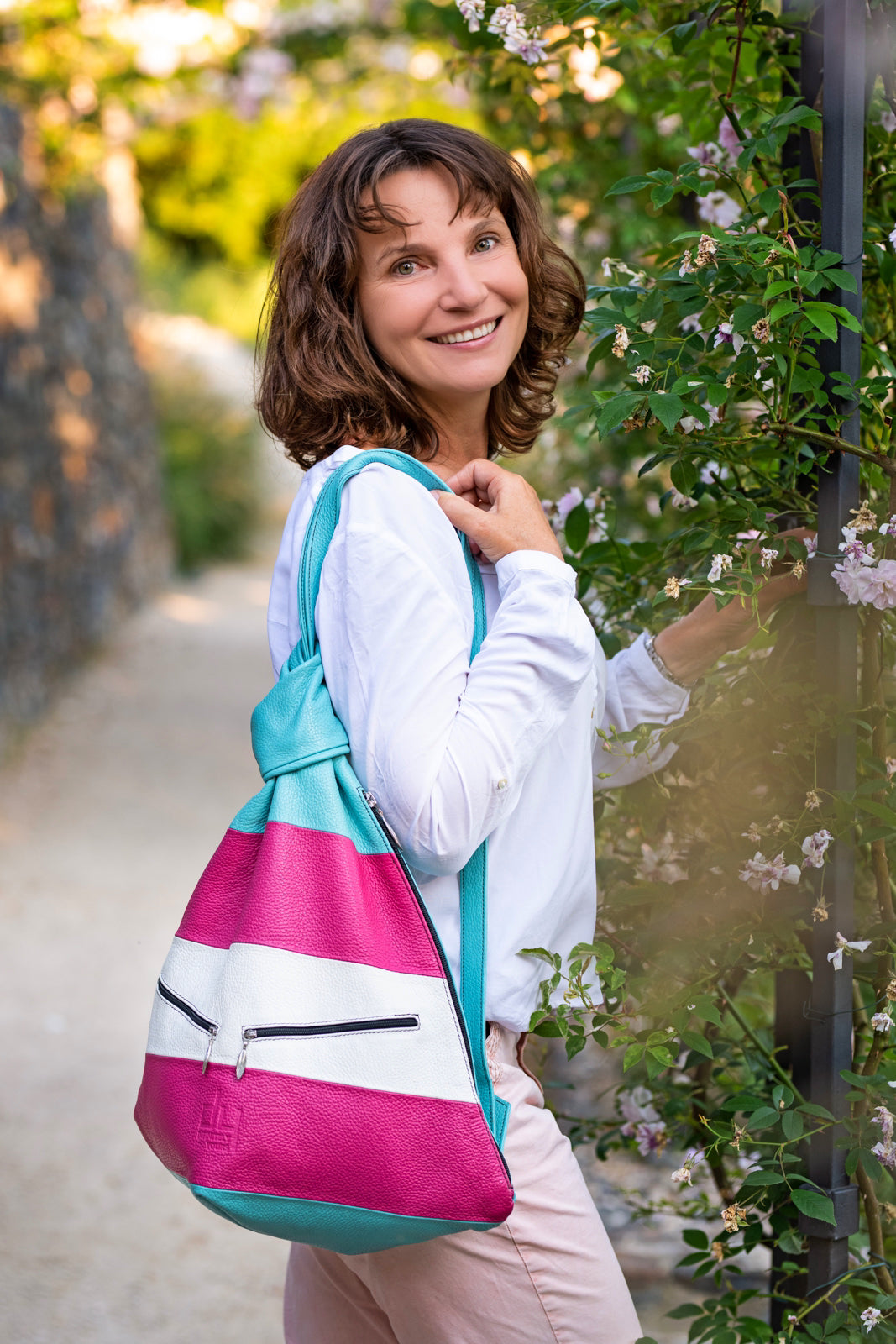 pink leather bag on a woman Radka Sillerova Atelier