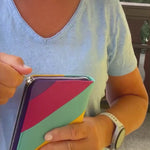 Leather wallet presented by a women outside in the nature