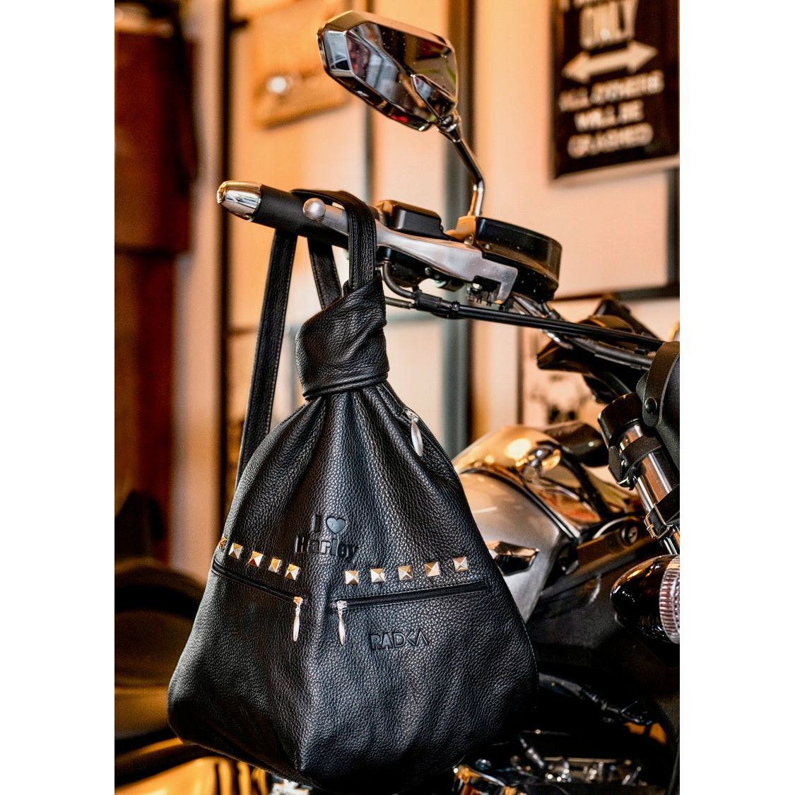 Biker Leather Backpack with Pyramid Studs – Bold Style for the Rock Enthusiast - Radka Sillerova Atelier
