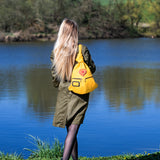 yellow leather handbag with red heart