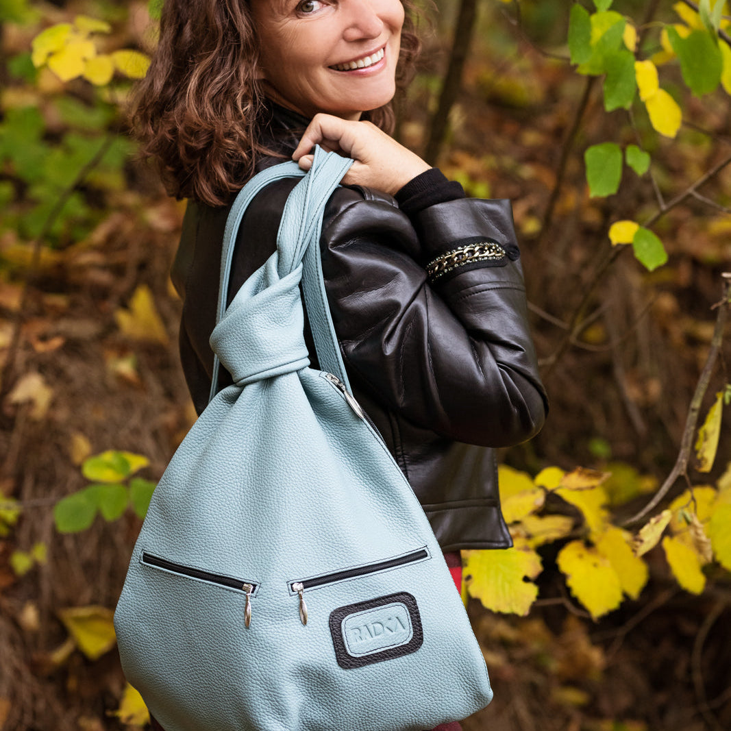 Leather Backpack with a women in autumn mood