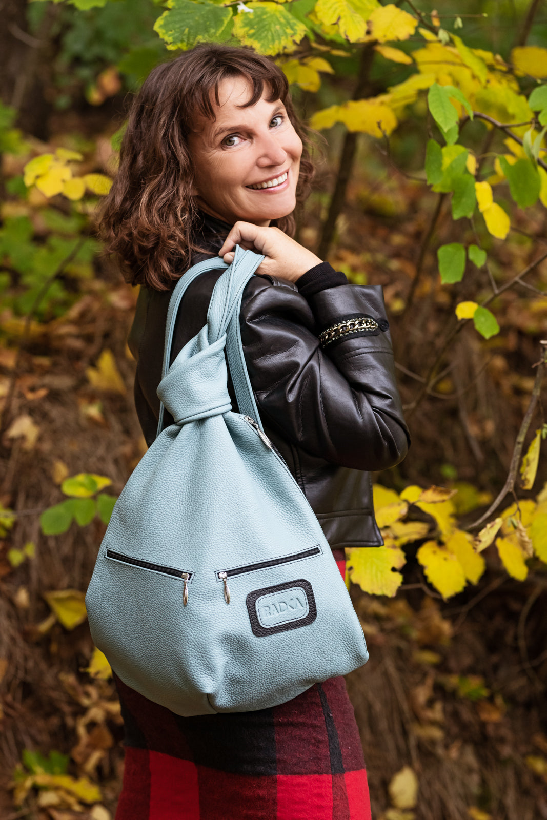 Leather Backpack with a women in autumn mood